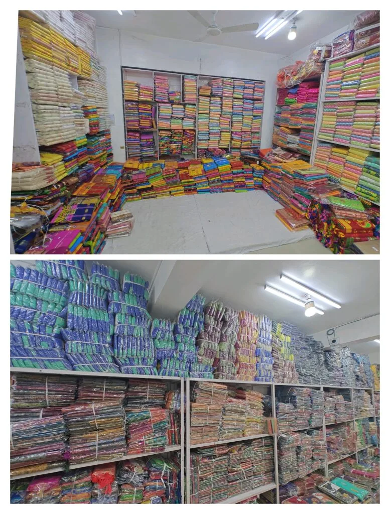 Bengali Santipur Tant sarees and uniform sarees stacked at Santosh Synthetics Jamshedpur.