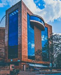 TCS modern glass office building in Jamshedpur near Santosh Synthetics