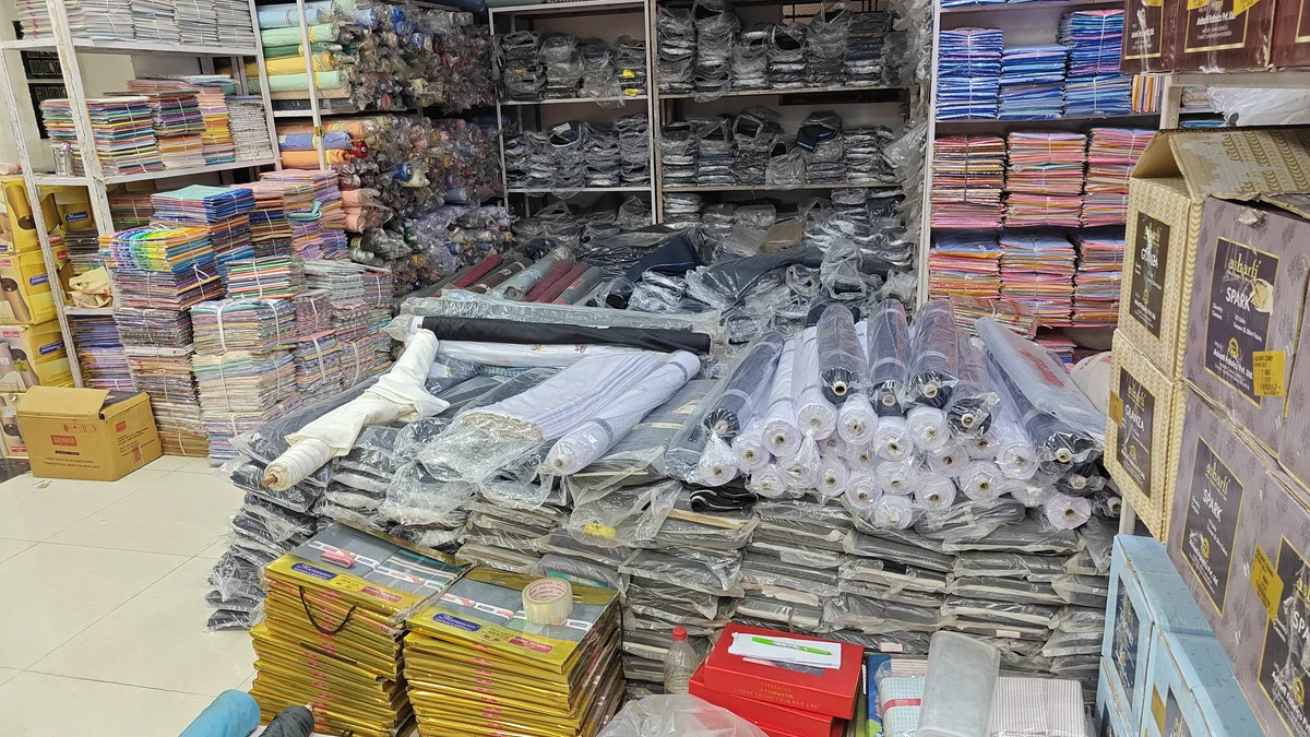 Top quality suiting shirting fabric rolls and cut pieces in bulk at Santosh Synthetics menswear wholesale Jamshedpur